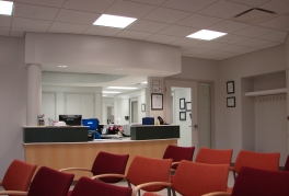 The waiting area and reception desk at the surgery center